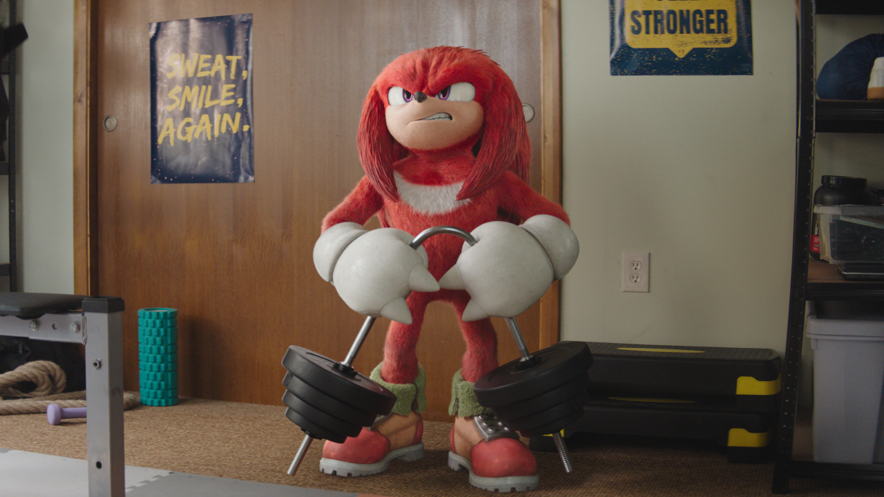 Knuckles plie une barre de poids dans Knuckles